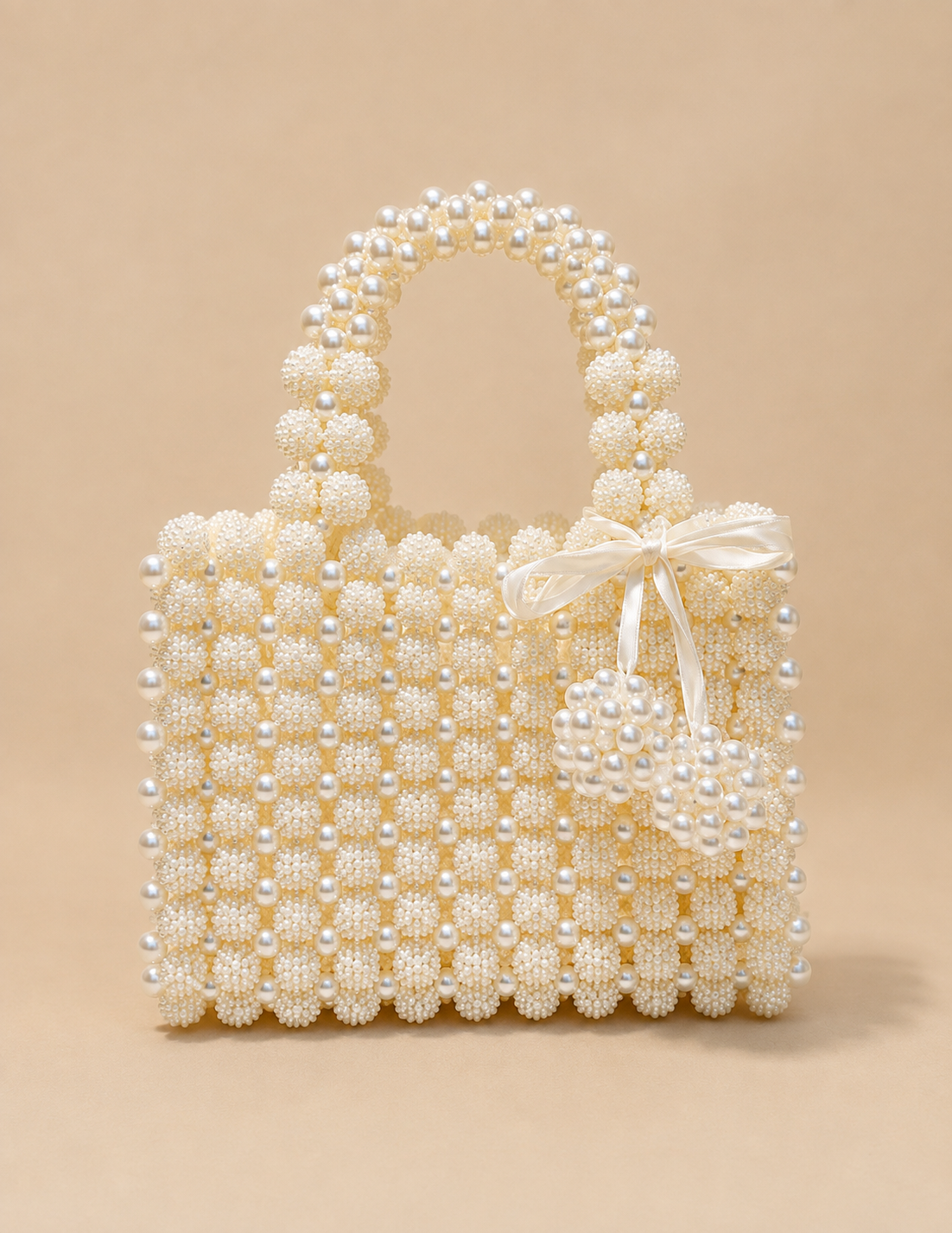 Elegant Handmade Pearl Tassel Handbag with Satin Bow – A Timeless Luxury Accessory